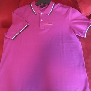 Prada polo with logo. Berry colored. Size 3XL but fits like an XL. Worn once.